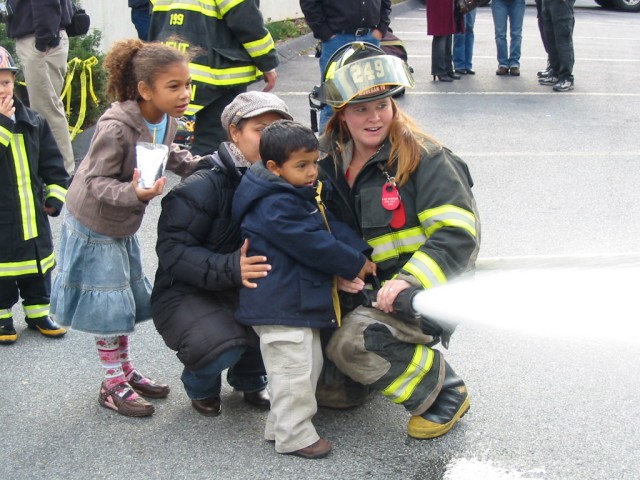 Firefighter Hartmann Showing Hoseline Operations at 2006 Open House