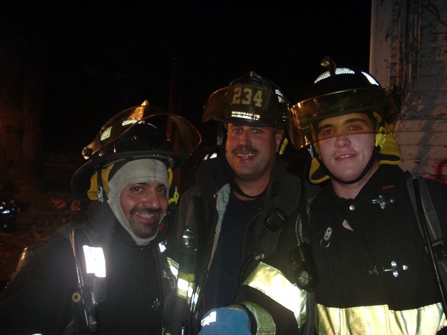 Paul, Paul, and Ken Smile For The Camera During A Training Session.