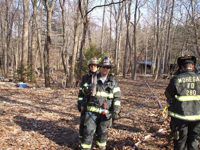 Father And Son Gravius Packing Up From A Brush Fire