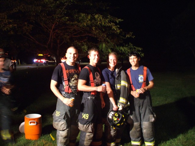 Firefighters Rosselli, Lentini, Gorbecki, And Myers Pose After Dryer Fire At Justin Court.