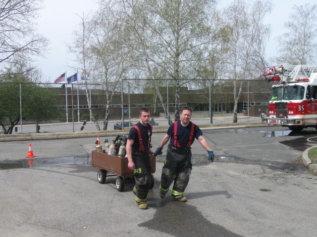 Eric And Eric Bringing The Empty Bottles To The Cascade System