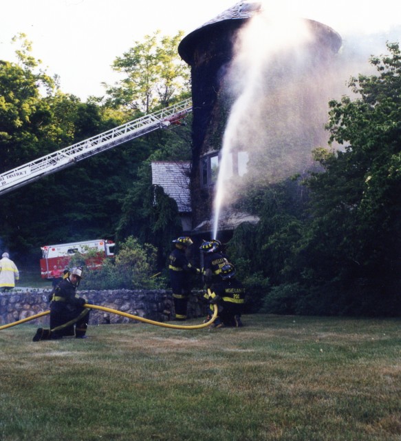 Mohegan firefighters Wetting Down Some Hot Spots