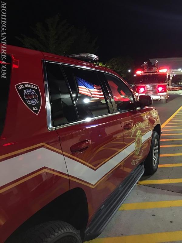 Mohegan FD operating at a commercial fire alarm activation at The Home Depot in the Cortlandt Town Center with American flag that is flown in the front of The Home Depot was seen reflecting almost perfectly off the window of the new Car 2262