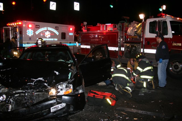 Members Treating The Injured At Rt 6 And TSP