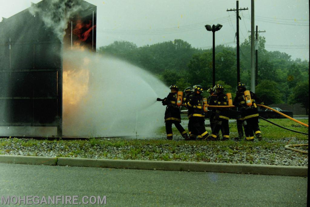 Members using the propane simulator during Firefighter Essentials in the early 1990's 