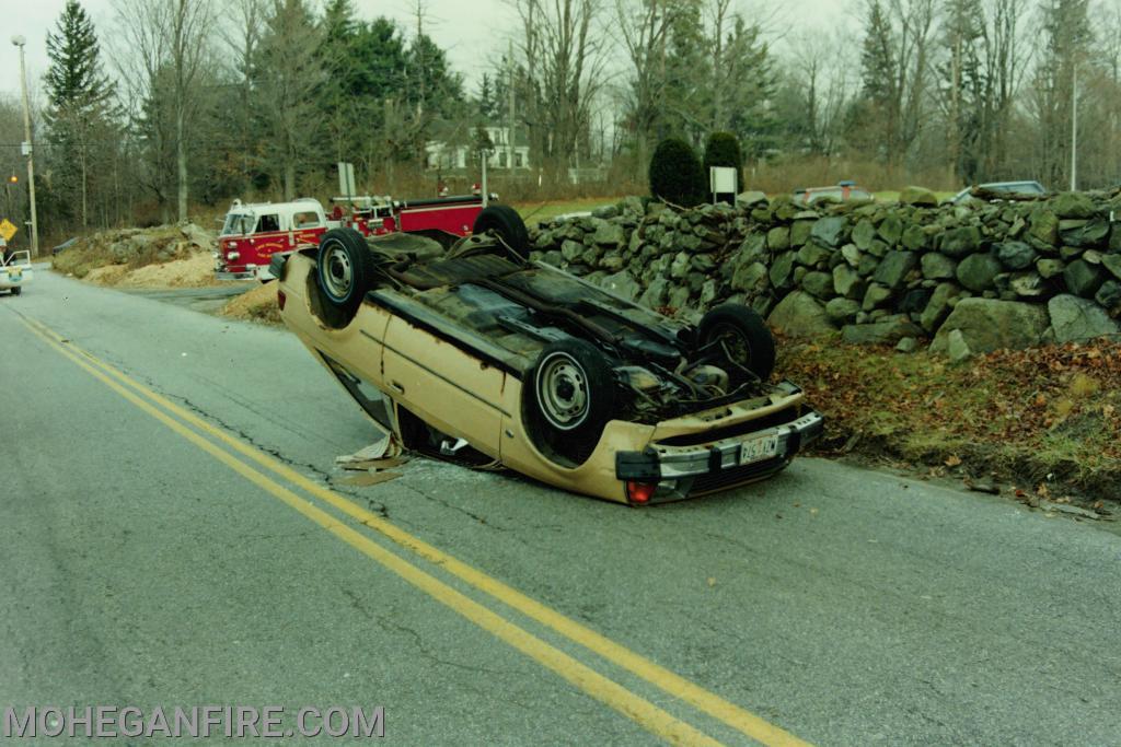 Rollover on Lexington Ave near Strawberry Road. The old Engine 253 in the background